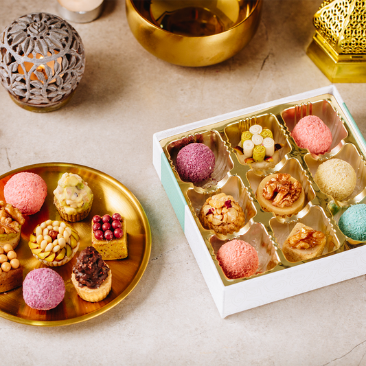 Handmade Mediterranean sweets in a 9 pieces gift box presented on a counter