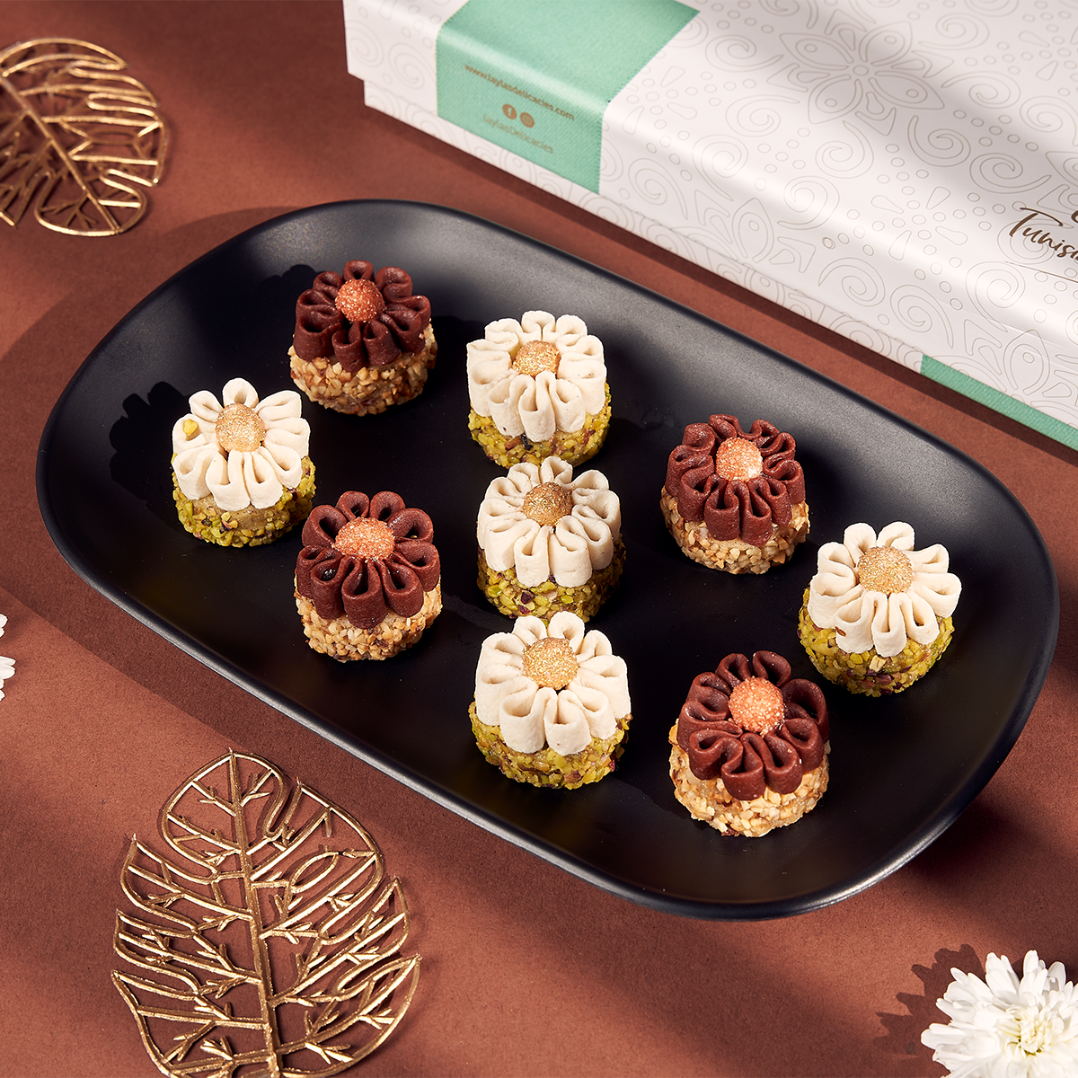 Flora summer edition box featuring pistachio and hazelnut flower-shaped delicacies