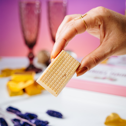 Hand holding Valentine's Angel Hair Dubai Chocolate piece