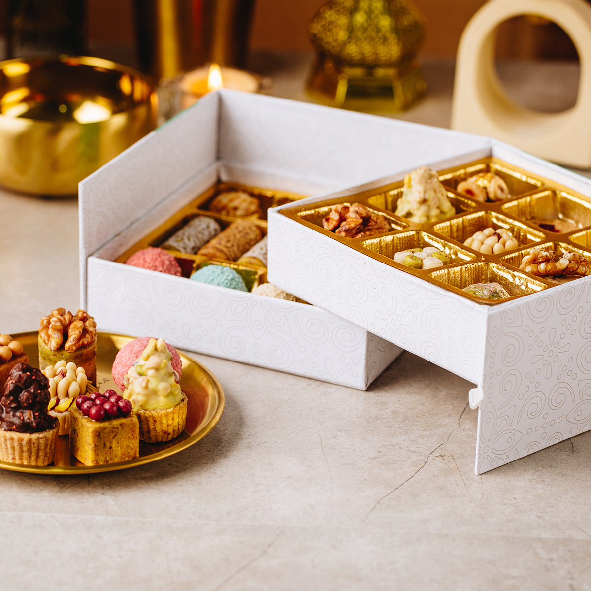 Layla's Delicacies 23 pieces Appreciation gift box with handcrafted Mediterranean sweets on a counter presented next to its sweets