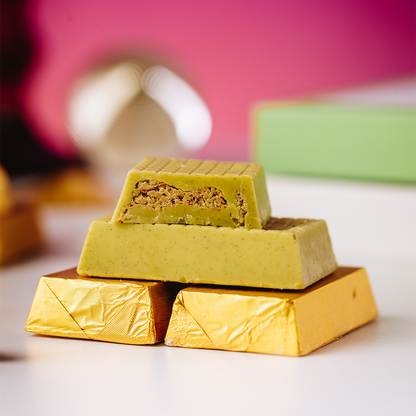 Valentine's Matcha Dubai Chocolate pieces closeup on a white surface 